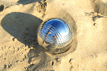 Image showing Foto of ball on sand reflecting sky