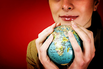 Image showing Globe in a girl's hands