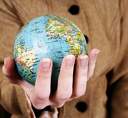 Image showing Globe in a girl's hands