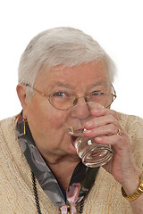 Image showing Senior woman drinking water