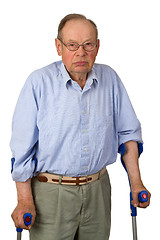 Image showing Male senior on crutches