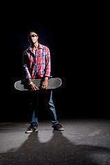 Image showing Cool Skateboarder Dude Posing