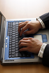 Image showing Businessman and laptop