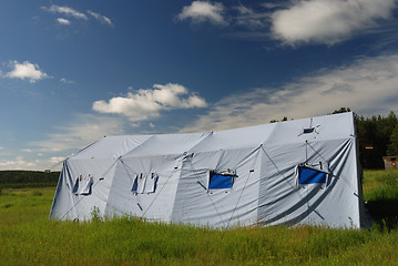 Image showing large tent in the meadow