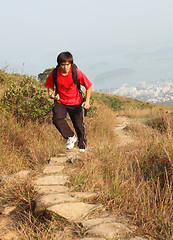 Image showing Sport hiking in mountains, walking and backpacking 