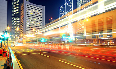 Image showing Traffic through the city (traffic seen as trails of light) 