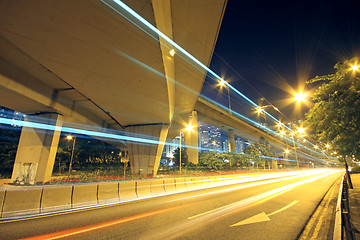 Image showing Traffic through the city (traffic seen as trails of light) 