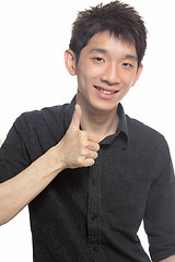 Image showing Portrait of hand showing goodluck sign against white background 