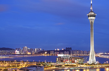 Image showing Urban landscape of Macau with famous traveling tower under sky n