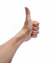 Image showing Portrait of hand showing goodluck sign against white background 