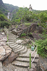 Image showing path through mountains ,stone step close up 