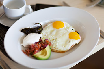 Image showing sunny side up eggs on a plate