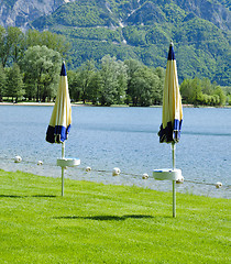 Image showing Closed beach umbrellas