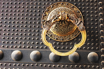 Image showing Doorknob on an ancient iron door