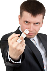 Image showing businessman shows Fuck. On the finger keys Ctrl Alt Del