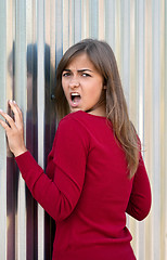 Image showing Beautiful girl in a purple dress