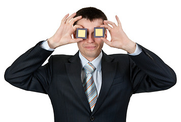 Image showing Businessman turned a blind eye two processors