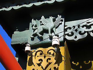 Image showing fragment of a old house with decorative carvings