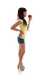 Image showing Healthy woman eating a apple