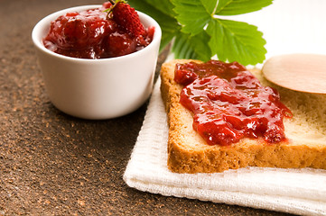 Image showing Wild strawberry jam with toast