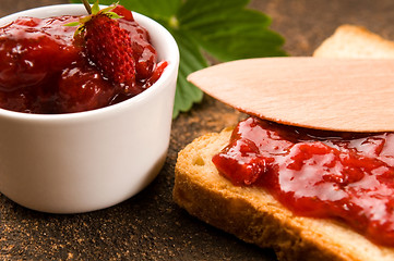 Image showing Wild strawberry jam with toast