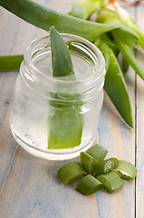 Image showing aloe vera juice with fresh leaves