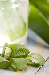 Image showing aloe vera juice with fresh leaves