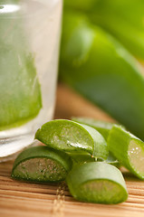 Image showing aloe vera juice with fresh leaves