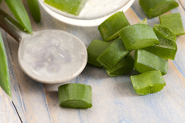 Image showing aloe vera juice with fresh leaves