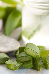 Image showing aloe vera juice with fresh leaves