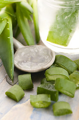 Image showing aloe vera juice with fresh leaves