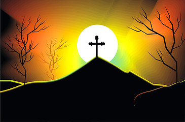 Image showing cross on a mountain side at sunset