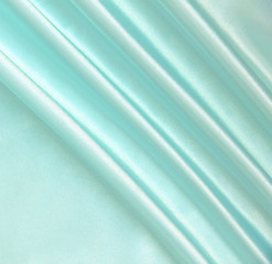 Image showing Smooth elegant blue silk as background 