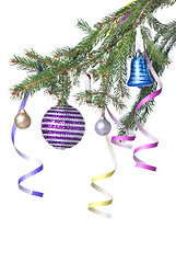 Image showing Christmas balls and decoration on fir tree branch isolated on wh