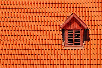 Image showing orange roof with window