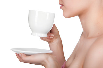 Image showing woman holding cup isolated on white
