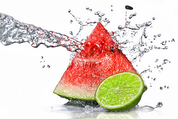 Image showing watermelon, lime and water splash isolated on white