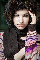 Image showing winter portrait of young woman in fur hat