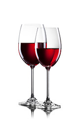 Image showing Red wine in glasses isolated on white