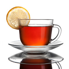 Image showing cup of tea with lemon isolated on white