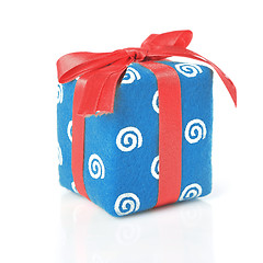 Image showing Blue gift with red ribbon isolated on white