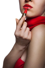 Image showing beautiful woman with red lips and lipstick isolated on white 