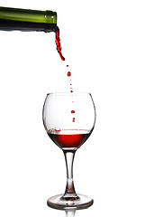 Image showing Pouring red wine in goblet