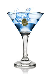 Image showing Blue alcohol cocktail with splash isolated on white