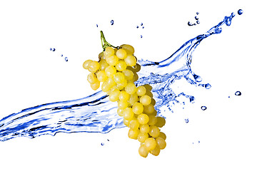 Image showing yellow grape with water splash isolated on white