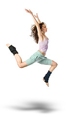 Image showing jumping young dancer isolated on white background