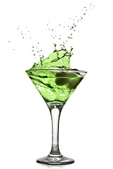 Image showing Green alcohol cocktail with splash isolated on white