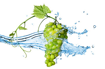 Image showing green grape with water with splash isolated on white
