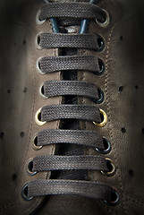 Image showing close-up laces on the brown boots