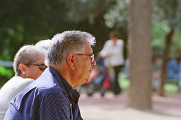 Image showing old men on bank in park